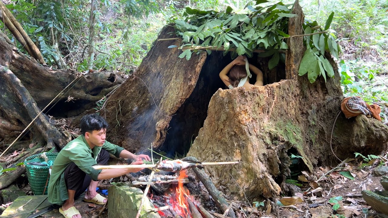 Young Couple Set Up A Tent Under An Old Tree - Catch Stream Fish Grilled On Rocks & Enjoy