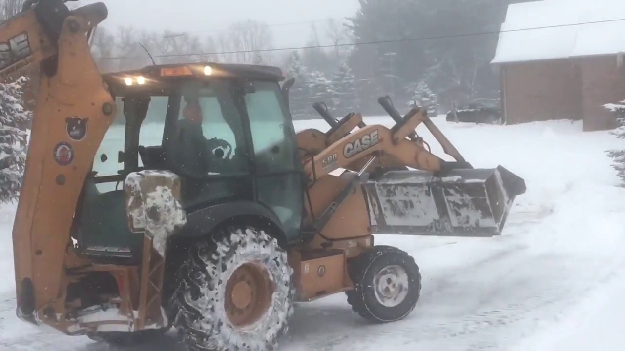 Plowing Snow with Backhoe - Awesome