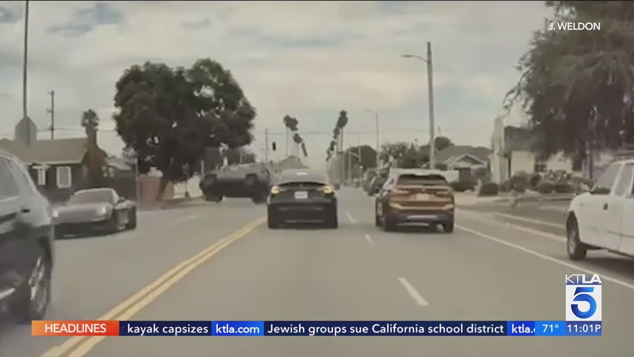 Video captures BMW run stop sign, cause multi-car crash in South L.A.