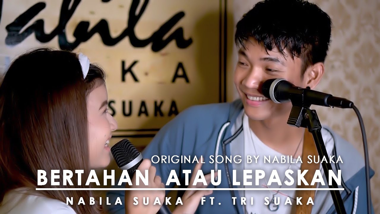 BERTAHAN ATAU LEPASKAN - NABILA (LIRIK) BY NABILA SUAKA FT. TRI SUAKA