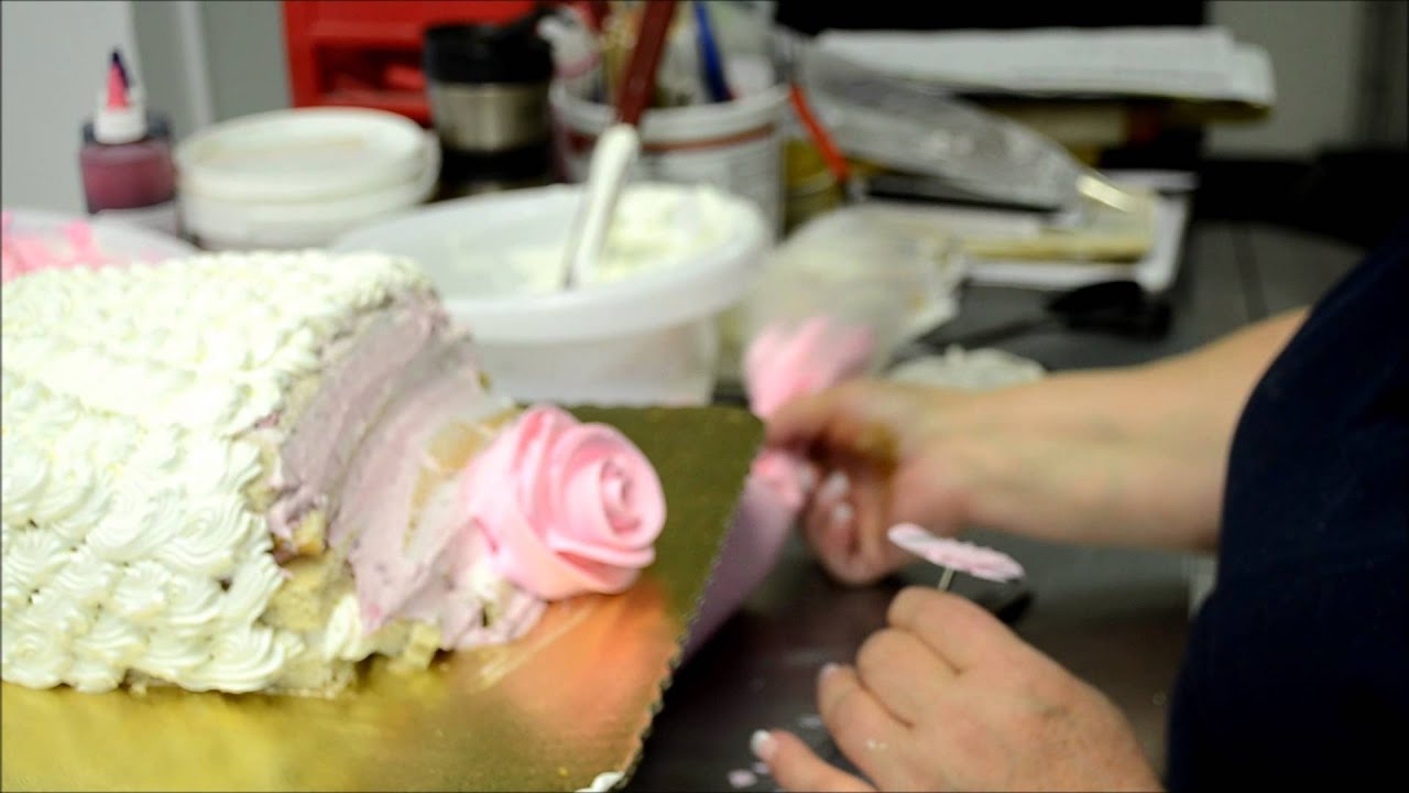 Making  birthday cake in bakery