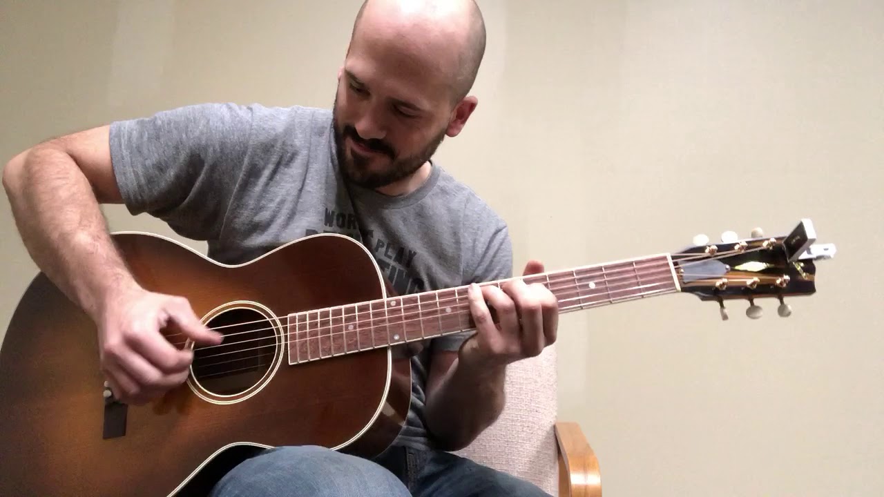 Matt Eich on ladder braced Fairbanks OO 12 fret.