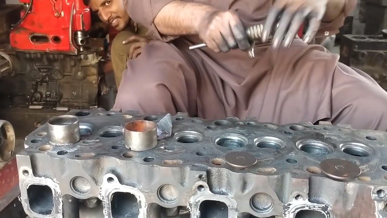 Toyota 3L engine head valve repairing 