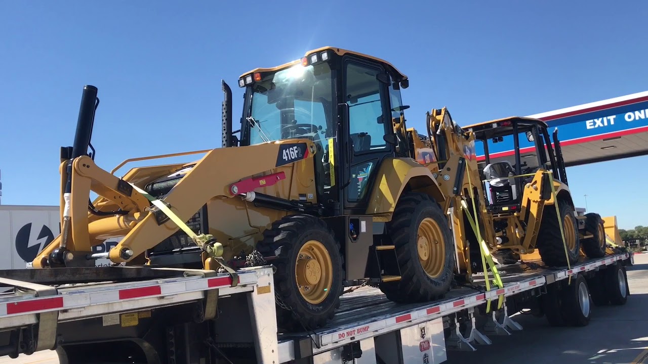 Stepdeck--Poles, Trailers, And Backhoes