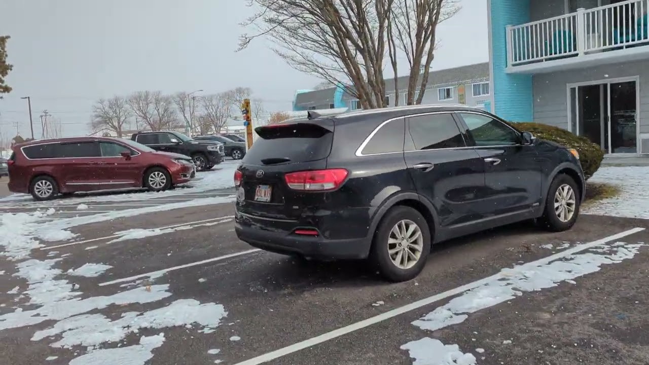 walking through Margaritaville Cape Cod. my first snow in eons