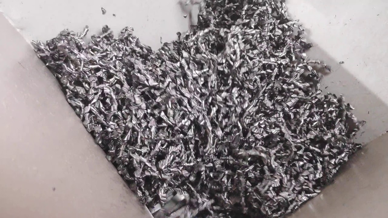 Metal turning , swarf shredder for cutting oil reclaimer or chip wringer system