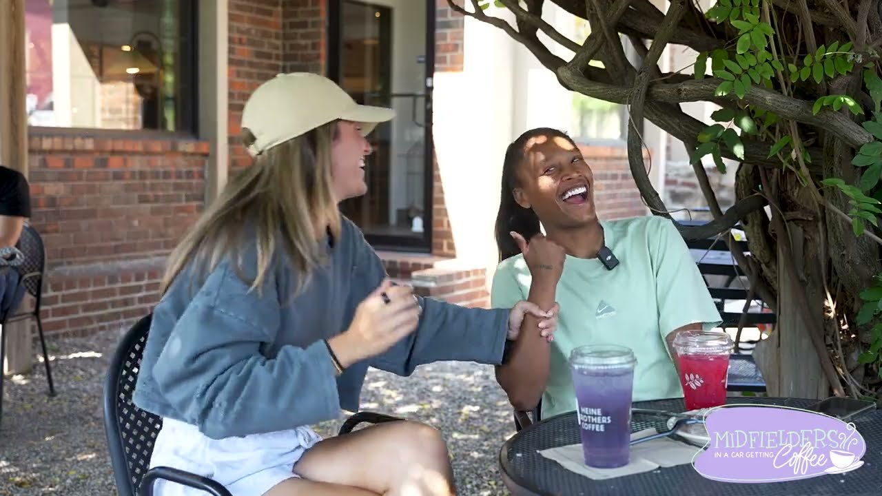 Midfielders in a car getting coffee with Emma Sears