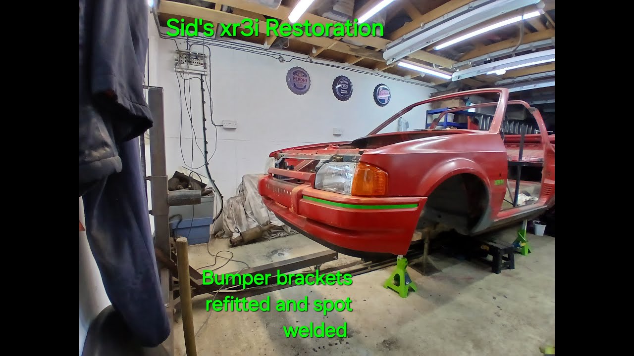 FORD ESCORT XR3I MK4 Cabriolet Restoration project. Bumper refit spot weld repaired brackets.