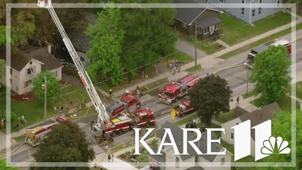 Volunteer firefighters battle blaze that damaged 2 homes and 121-year-old church