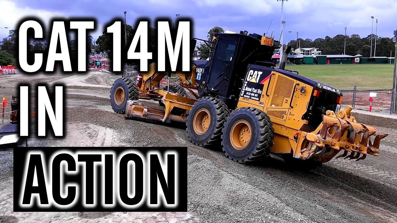 CAT 140M Grader: Grader Doing Some Tidy Final Trim Work On A Batter.