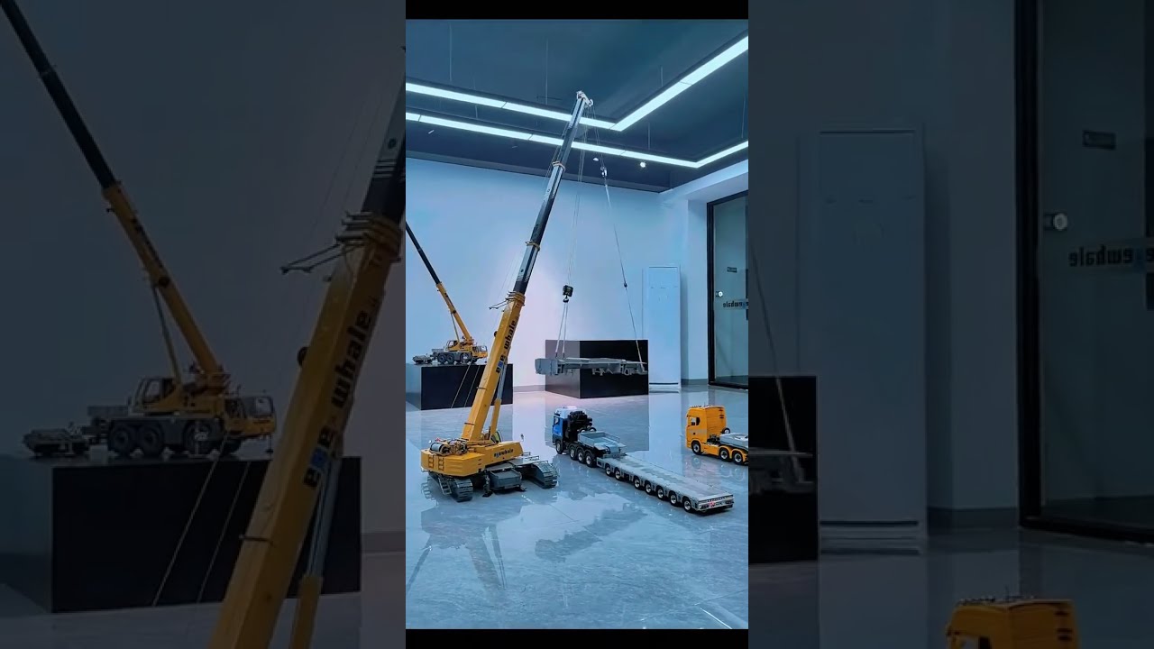 The process of building a crane using another crane.