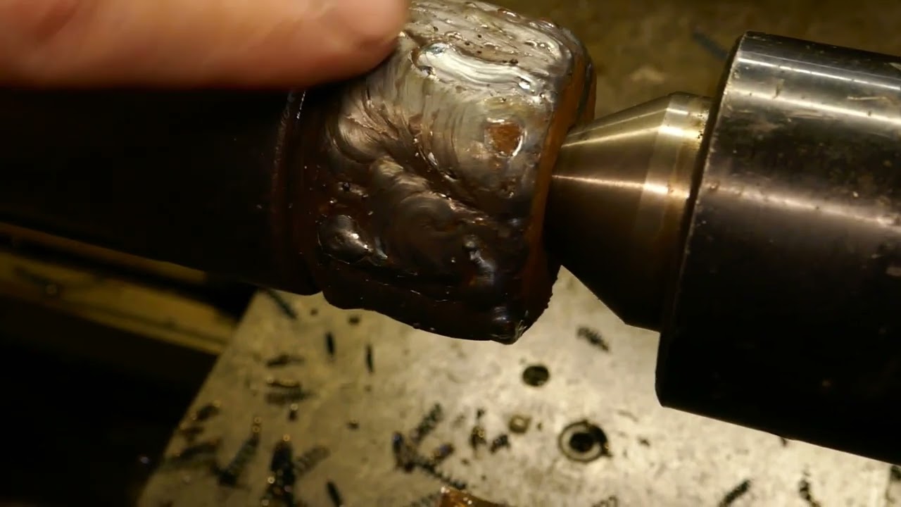 Restoring a worn & rusty thread on a motor armature shaft. Part 1 - turning & welding & turning...