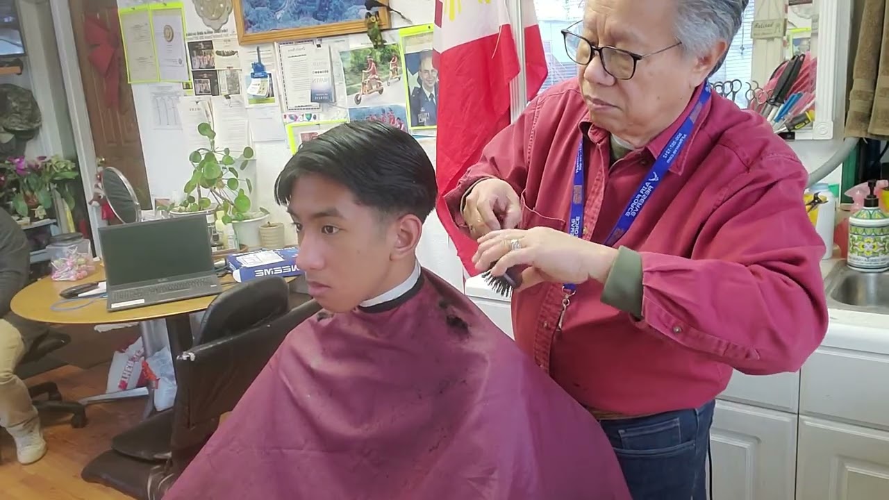 Short, low tapered haircut