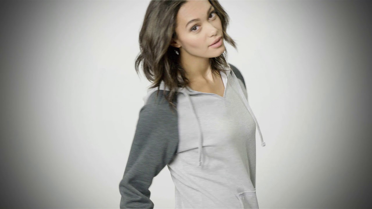 District Juniors Lightweight Fleece Raglan Hoodie.  DT296