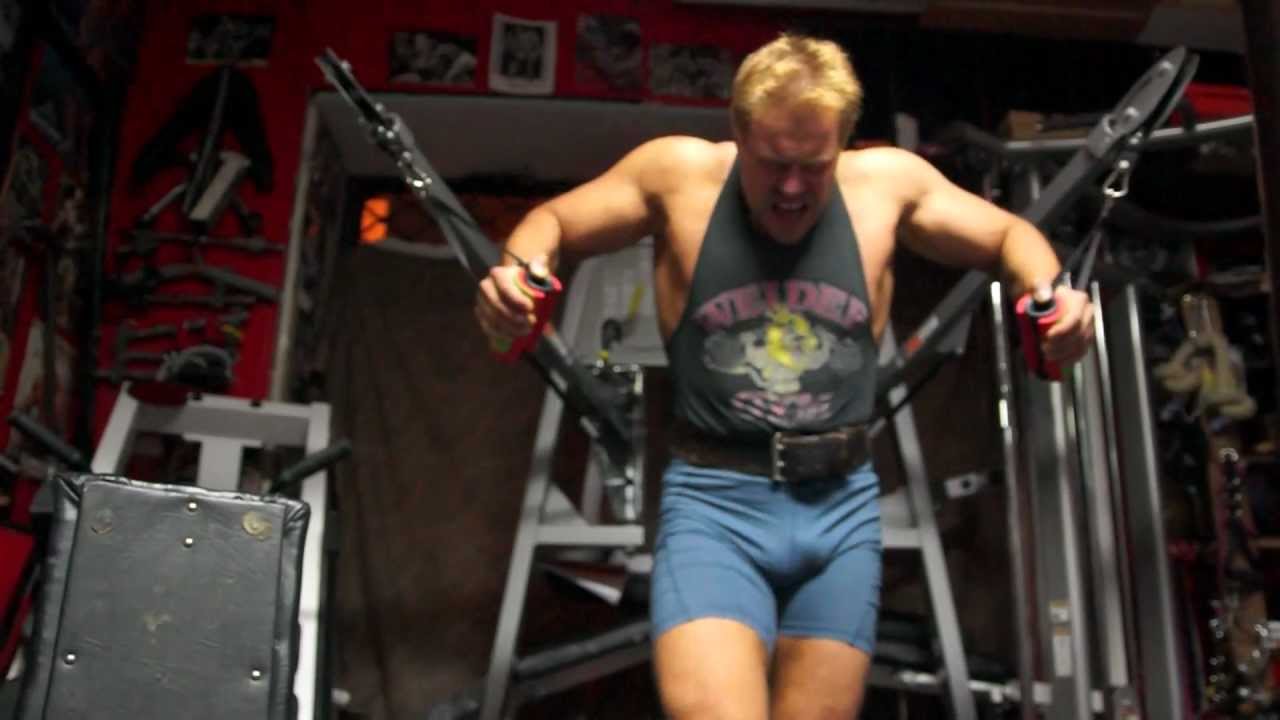Michael Gundill performs a set of 100 cable cross over for chest
