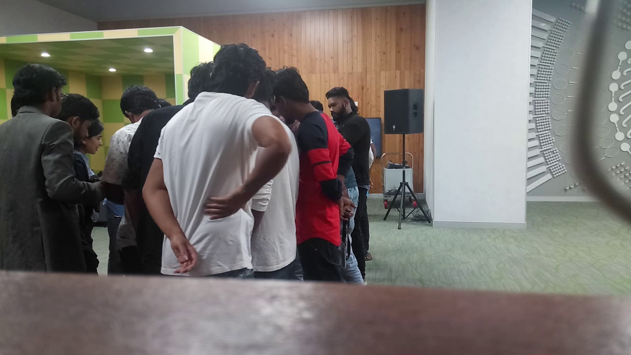 Male MC Thamizharasan signing off after hosting Foosball Table Football game at OMR