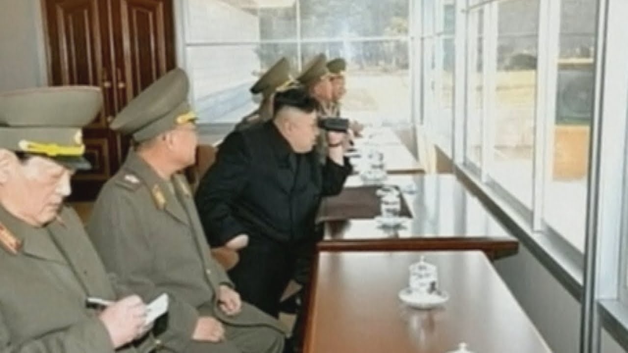 North Korea: Kim Jong-un launches missile into sea and watches shooting contest
