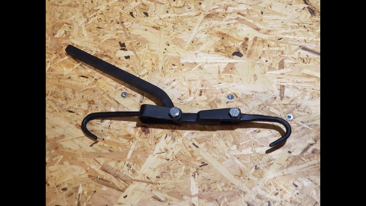 Making tire chain tightening tool