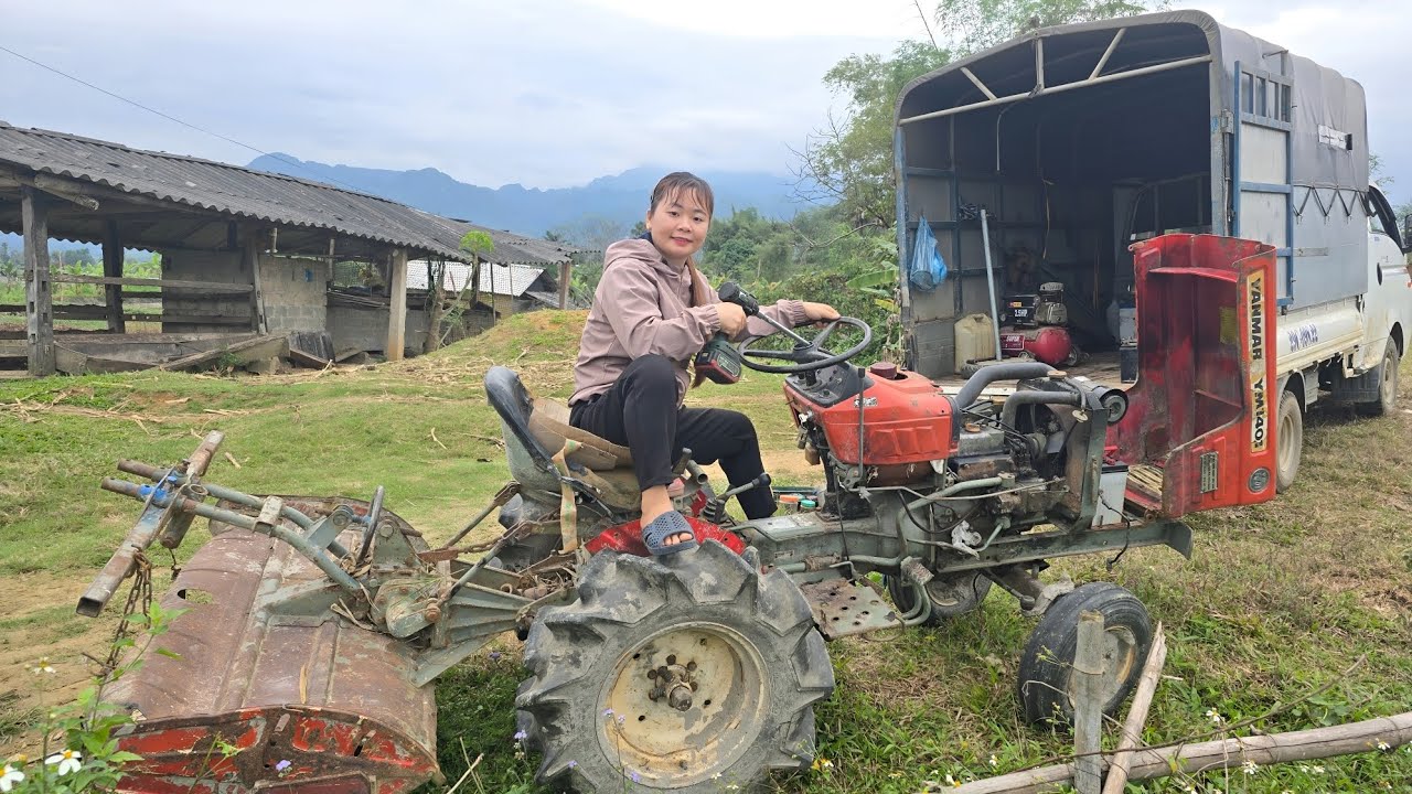 The girl repaired and restored the tractor for her neighbor.