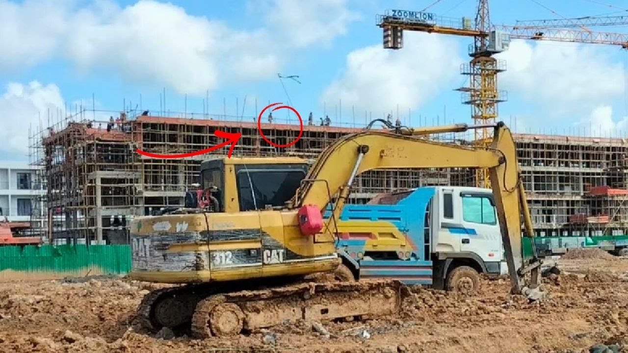 Excavator Loading Dump Truck in Muddy Field | Amazing Heavy Machinery