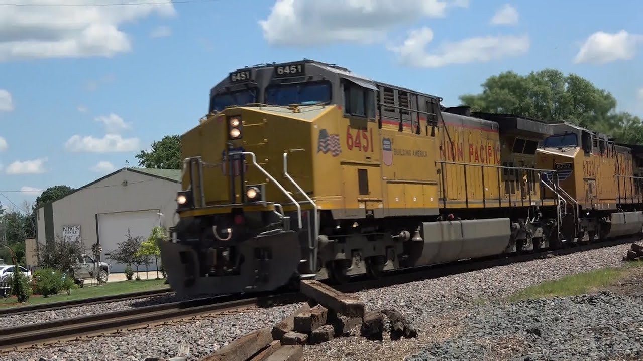 FAST FREIGHT TRAINS ON THE UNION PACIFIC CLINTON SUB! UNLOADING A RAIL EXCAVATOR AND DRONE VIEWS!