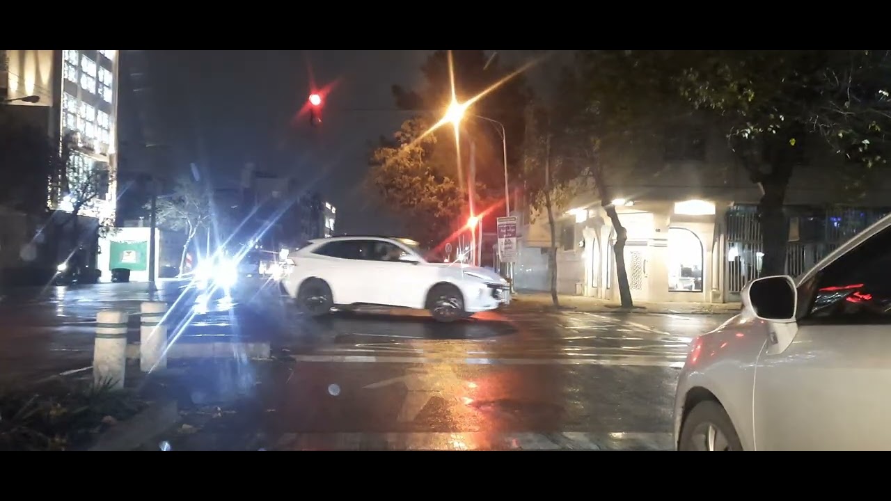 DRIVING ON THE RAIN STREET . MASHHAD CITY TOUR DRIVING .4 WAY MAJD TO BEHESHT STREET .
