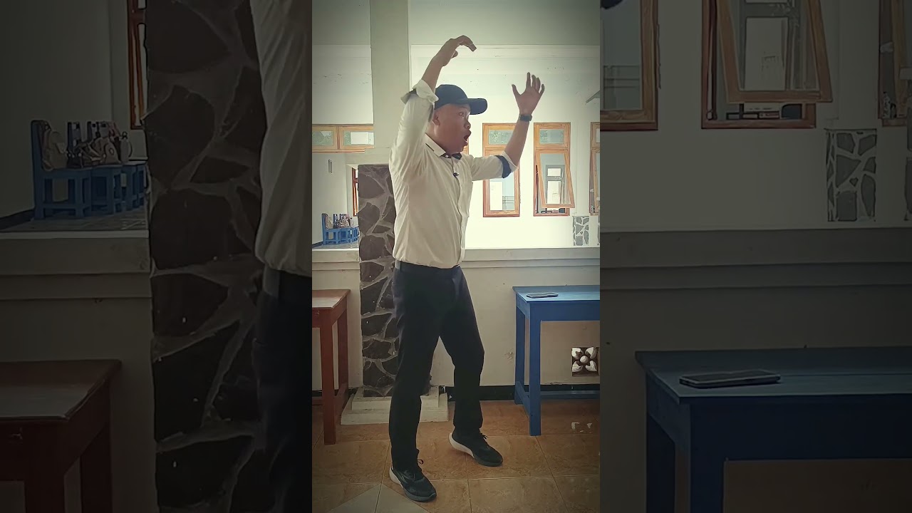 Dirijen Himne Guru yang benar pak ipin