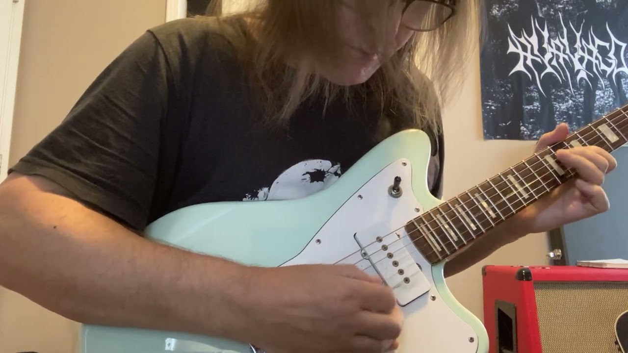 In the style of Hank Marvin and the Shadows. 