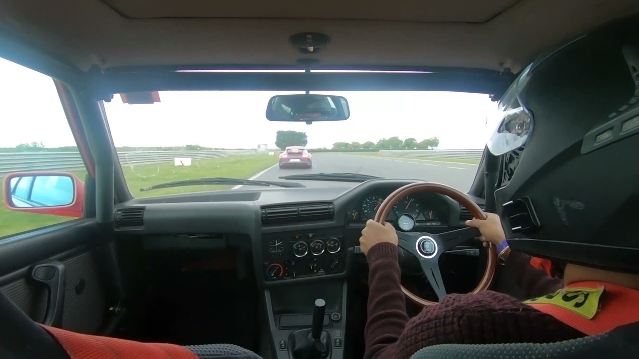 E30 S54 chasing Porsche 911 GT3 at Snetterton