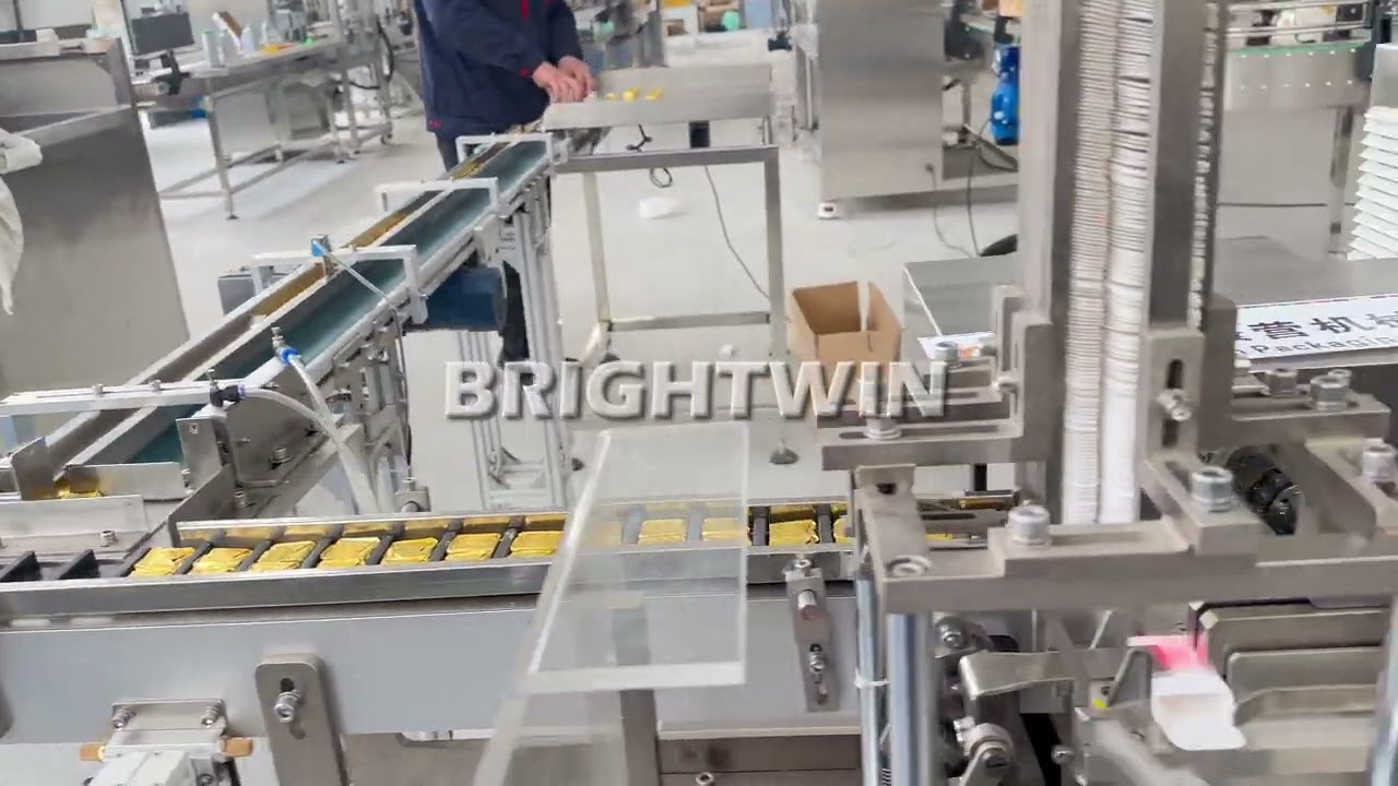10g chicken cubes box packing laser coding machine 80 boxes/min for an Jordanian client (2 in 1 box)