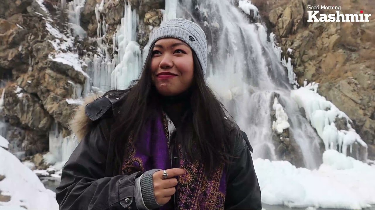 Majestic! Tourists enjoy frozen waterfall of Drang near Gulmarg