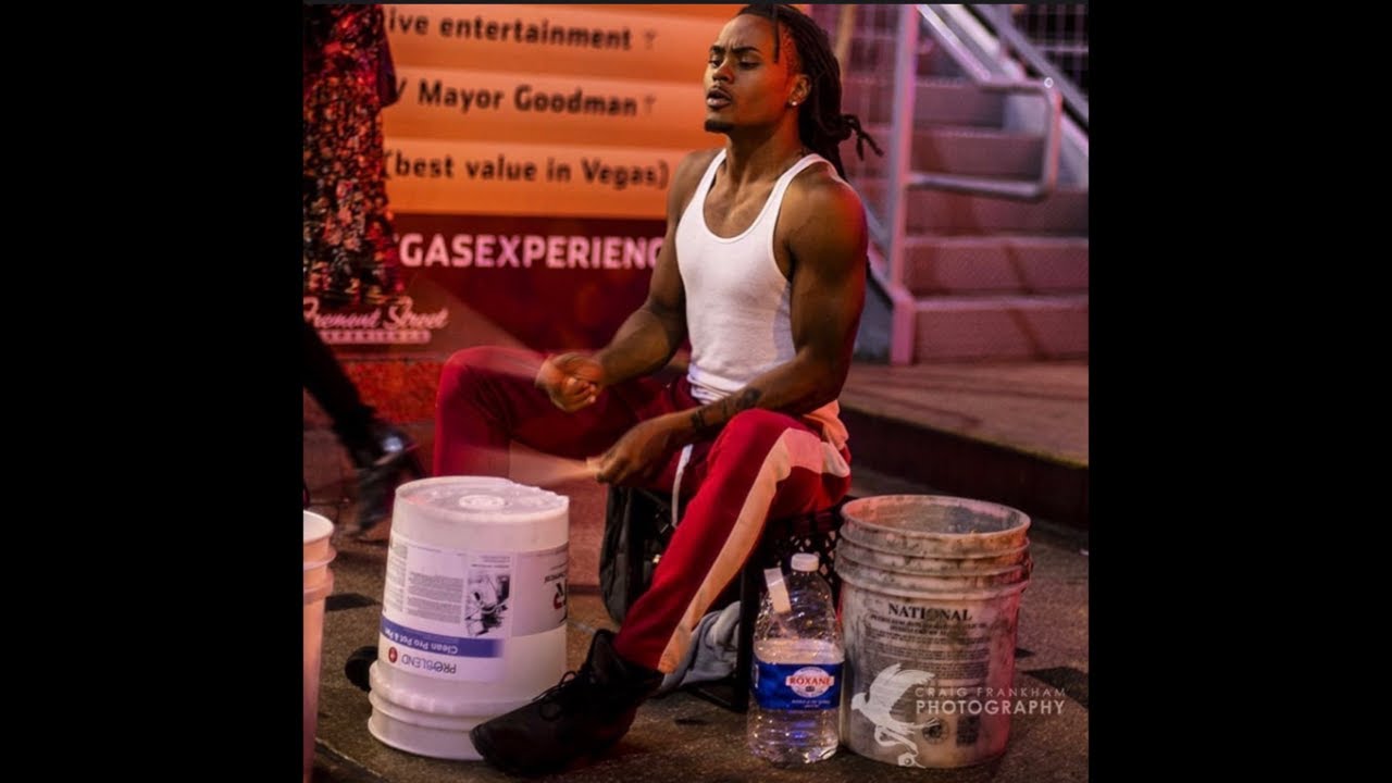 1MRED is live bucket drumming street performing busking on the las vegas strip