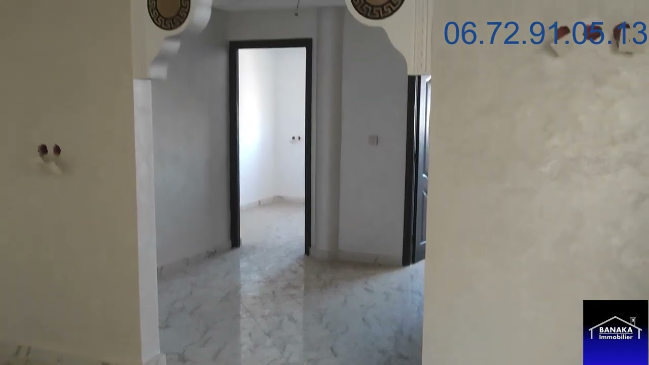 (2) رقم الاعلان 124 شقاق في ديور سهلي قرب شارع بن الهيتم سلا