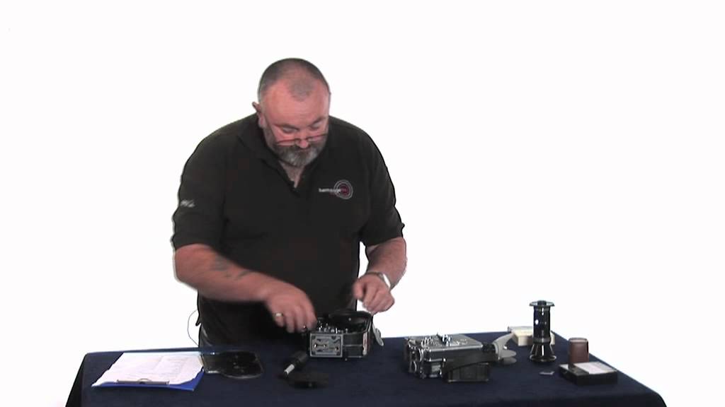 Loading a Bolex film camera
