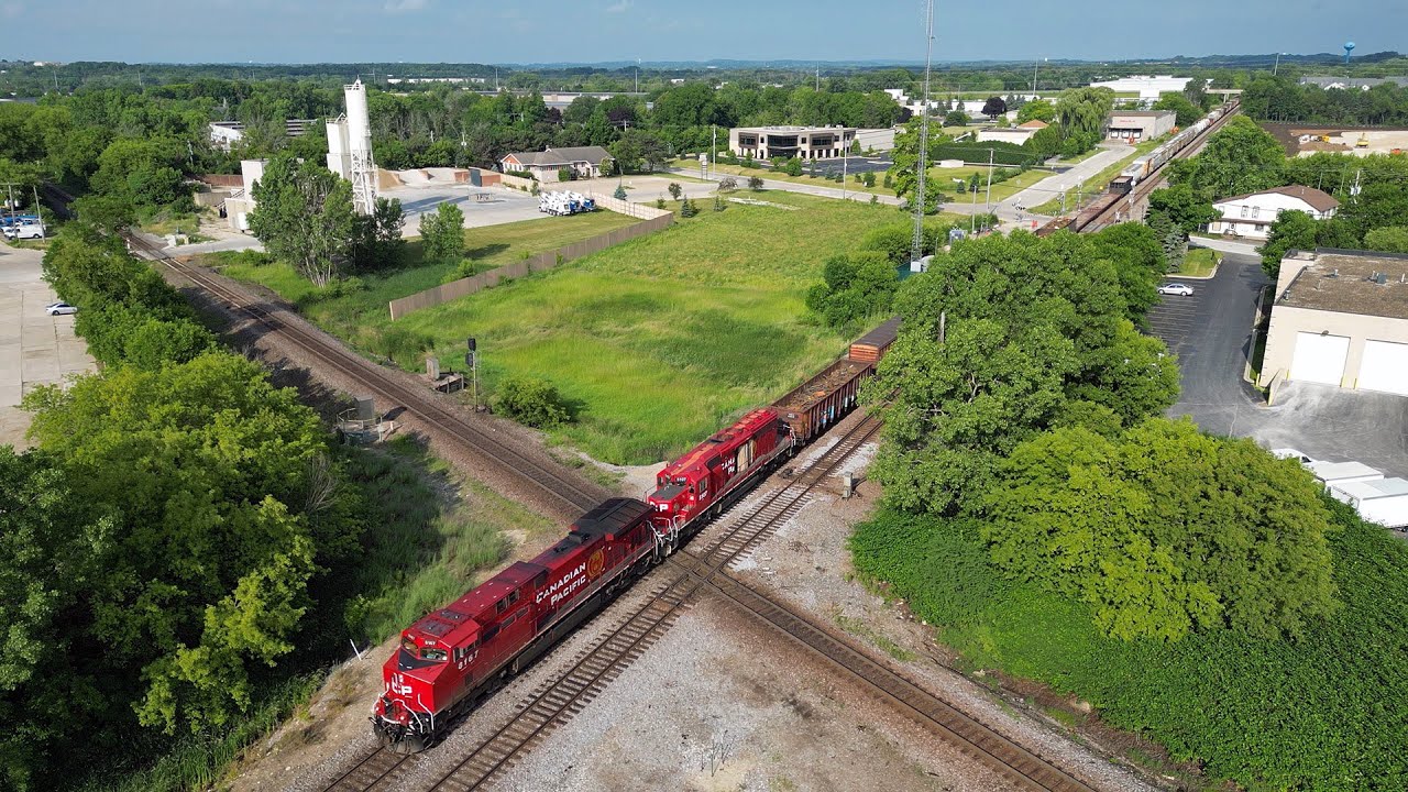 CN CPKC diamong crossing at Duplainville - June 2023