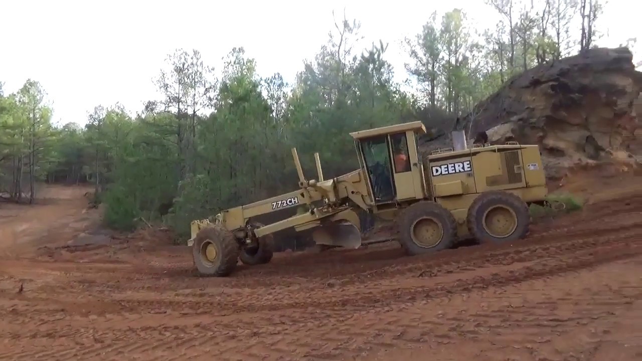 John Deere 6 wheel drive road grader in action!