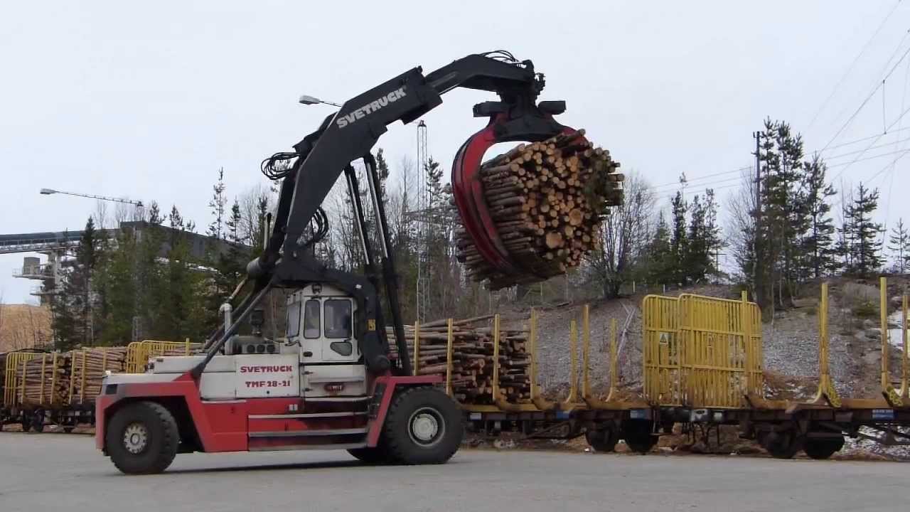 Svetruck TMF 28-21 unloading timberwagons