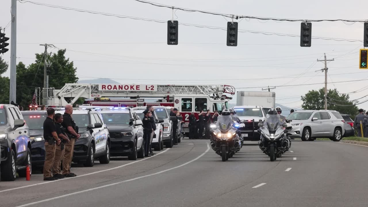 State Police escort remains of Carroll County Deputy Sheriff Logan Utt