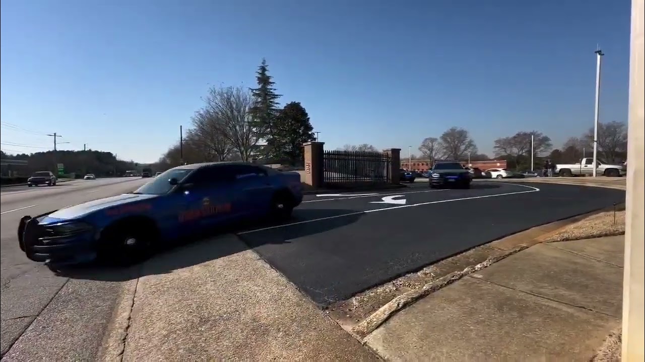 Georgia state patrol leaving funeral 