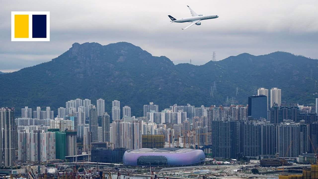 Cathay Pacific plane flies past Hong Kong’s Kai Tak once again