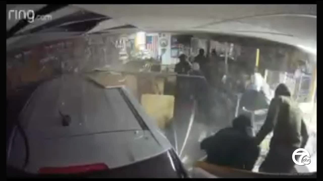 Thieves drive cars through 2 metro Detroit gun stores, nearly 100 guns stolen
