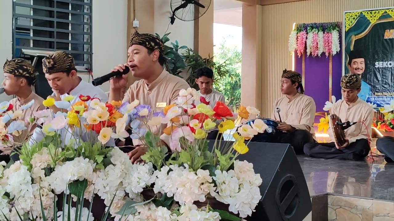 PERSEMBAHAN OLEH KUMPULAN PUSAKA EMAS sempana perasmian Mesyuarat Agung PIBG 2026