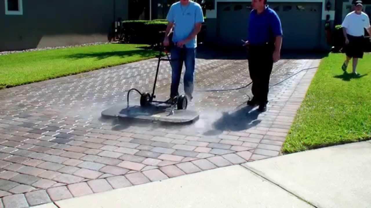 48" surface cleaner cleaning a paver driveway at 200 Square Feet Per Minute! Details 800-666-1992
