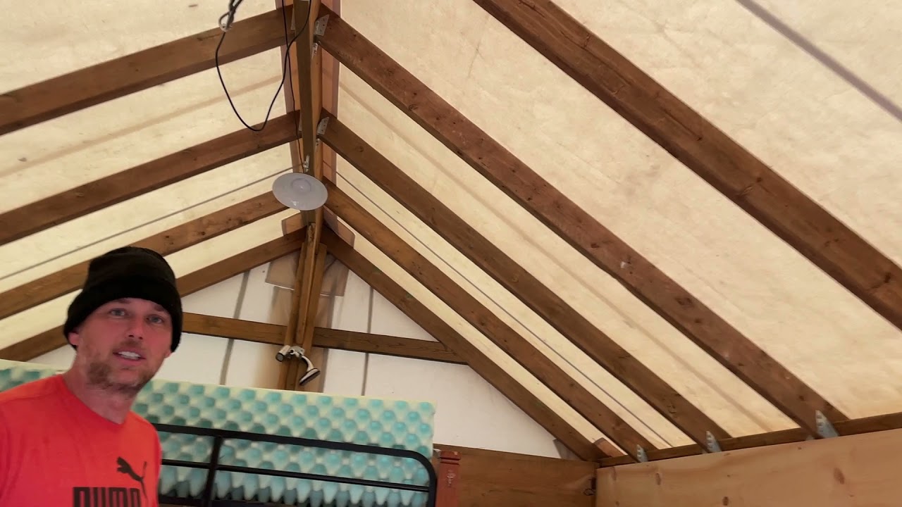 Canvas wall tent on wooden frame cabin style