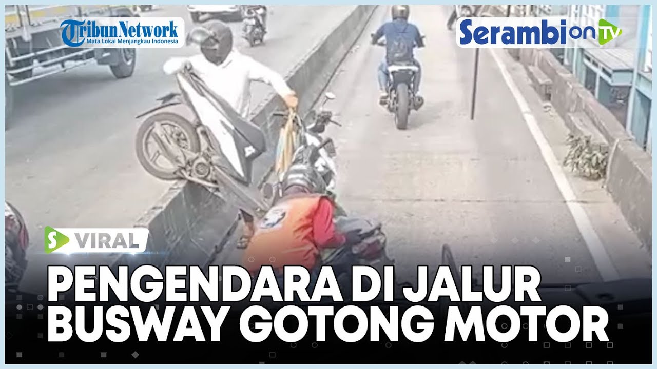 VIRAL Takut Ditilang Pengendara di Jalur Busway Gotong Motor Namun Gagal