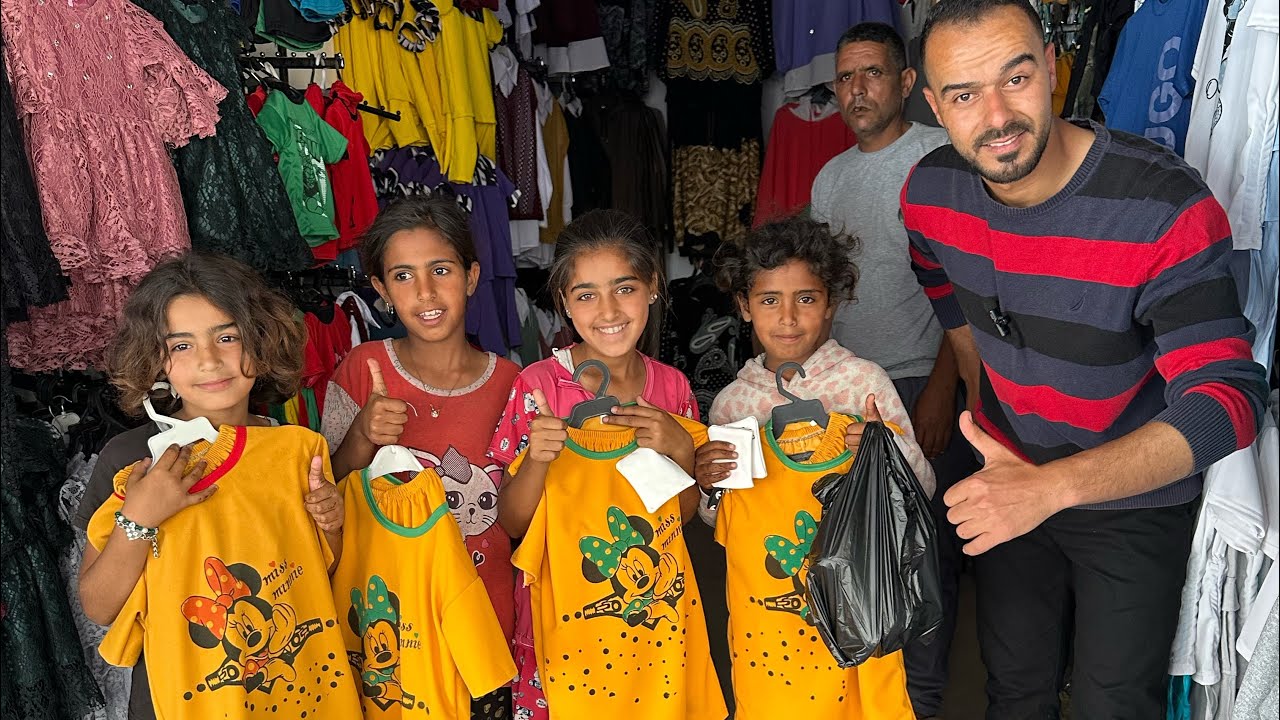 كسوة الاولاد بالشارع بمناسبة عيد الاضحى