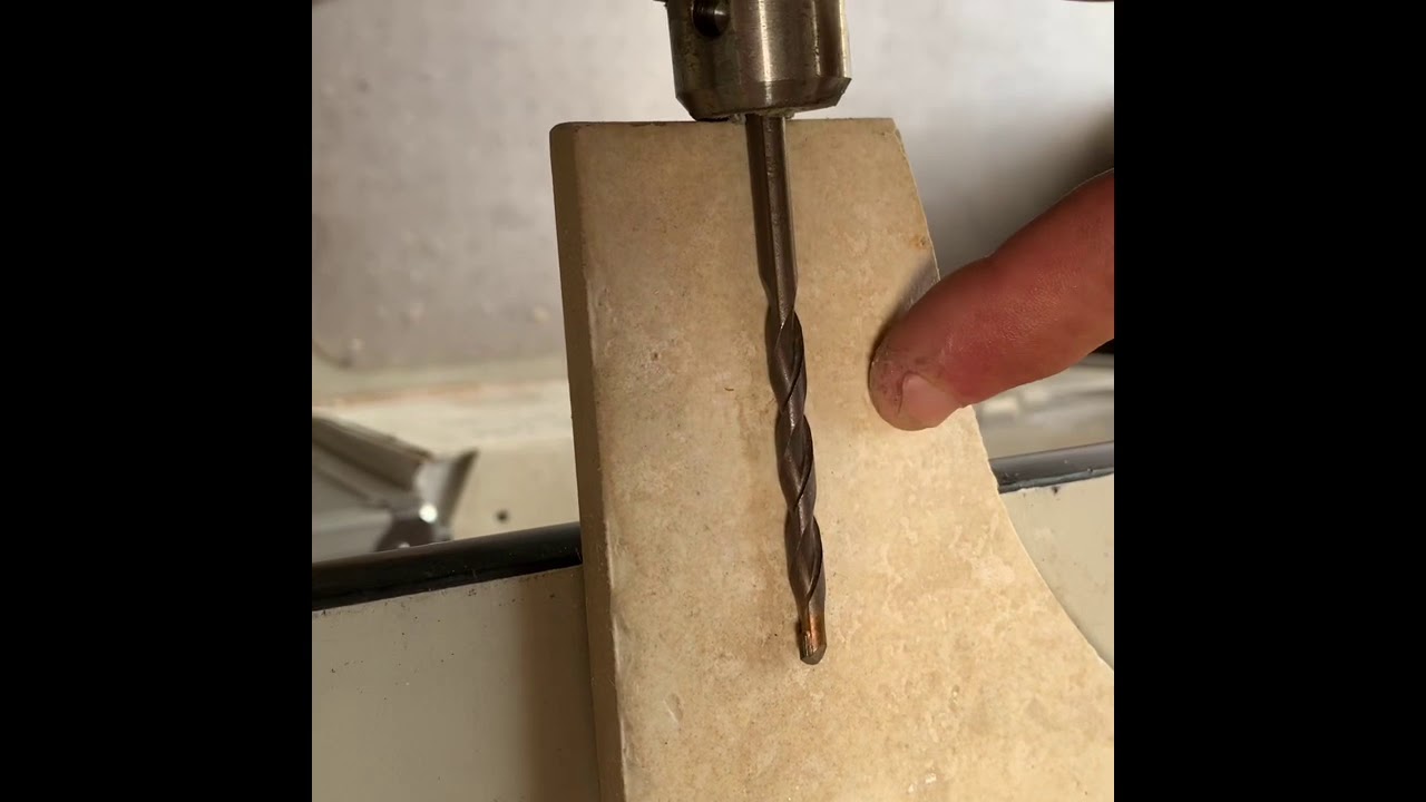 Drilling hard travertine tile with our Sizzlebit in record time!