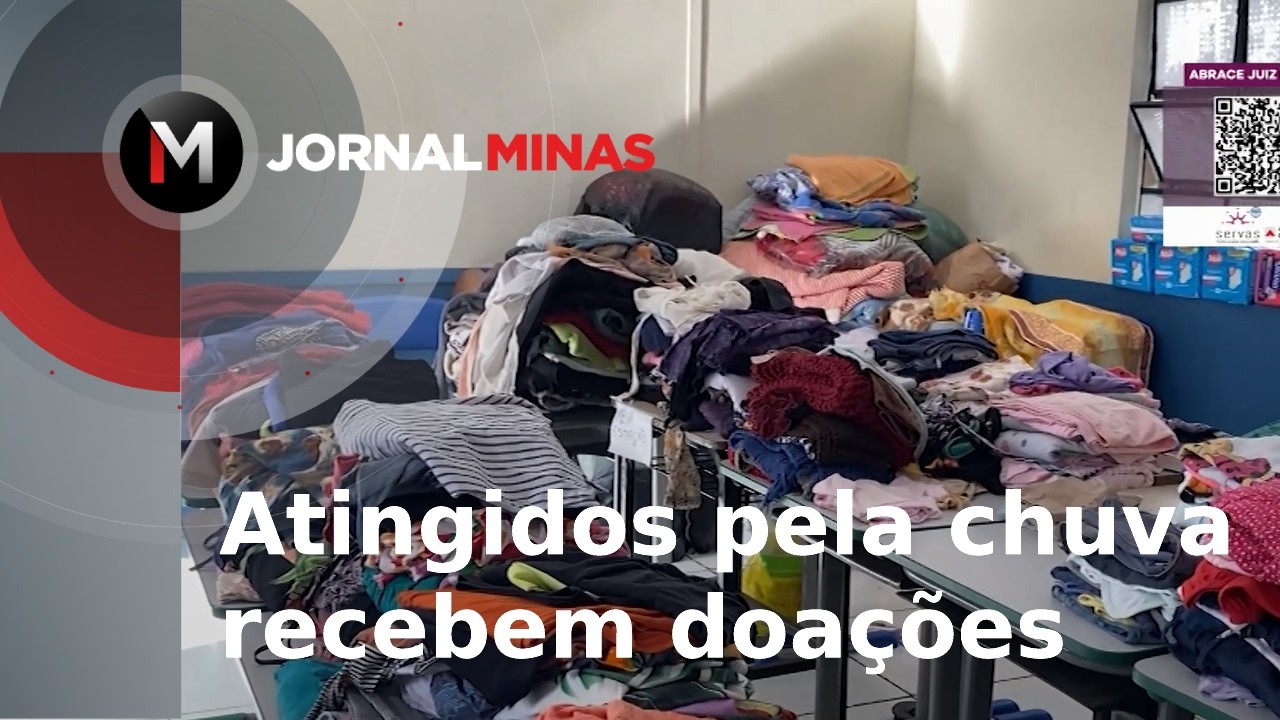 Atingidos pela chuva recebem doações - Jornal Minas