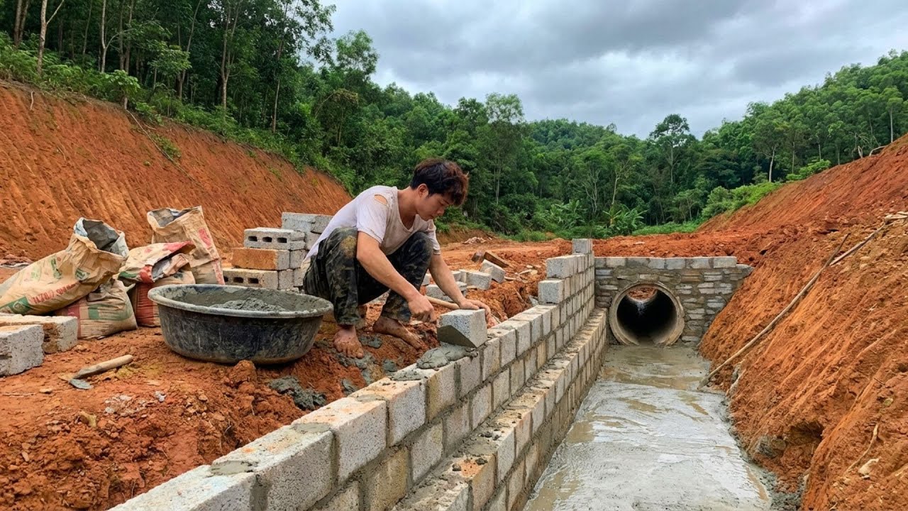 Building a Drainage Culvert to Prevent Flooding on the Farm During the Rainy Season