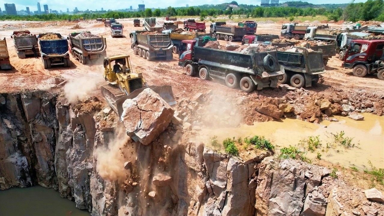 Well Done! Komatsu D68E Dozer Fast Process Moving Stones While Many Trucks Transport Wait Unload